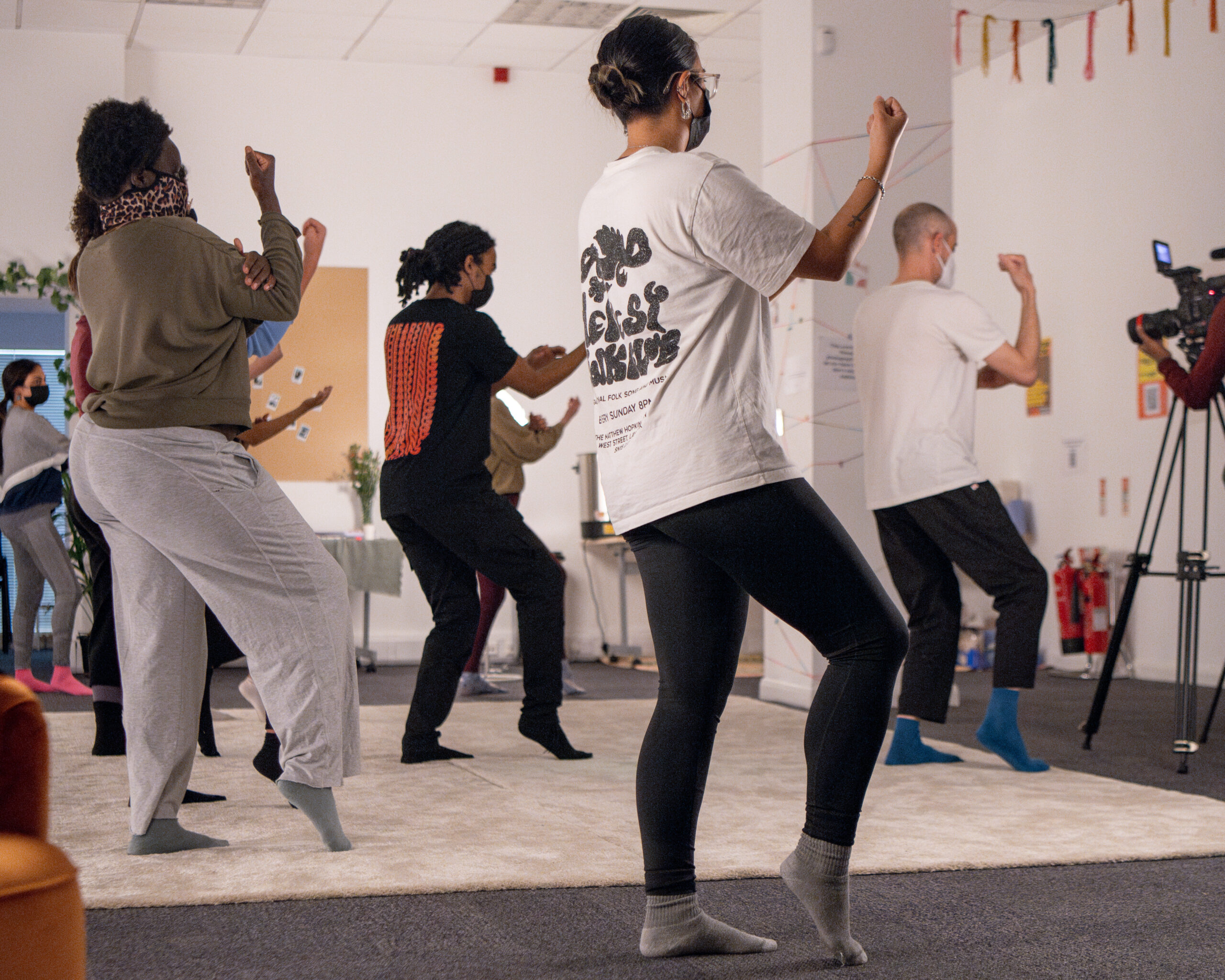 a group of people in a punching stance