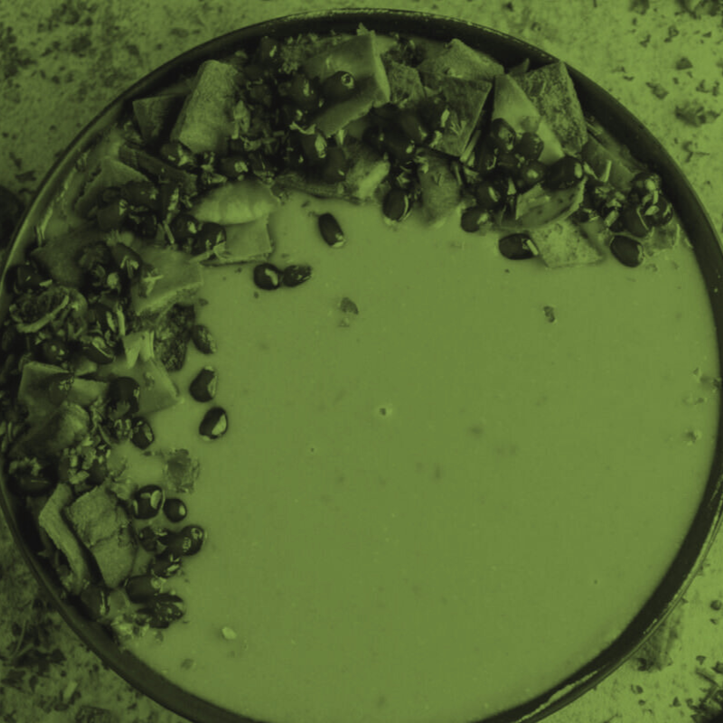 Bowl of lentil soup with green filter overlay